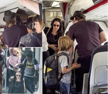 Brad Pitt and Angelina Jolie travel economy class with children